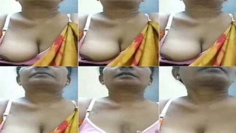 MILF aunty showing boobs out from saree and bra