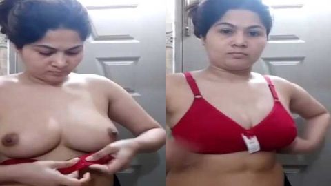 Beautiful housewife trying new bra on cam