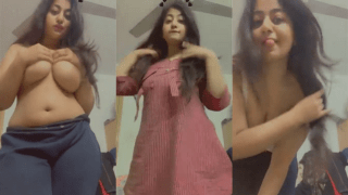 Chubby Girl Strips Presses Big Boobies
