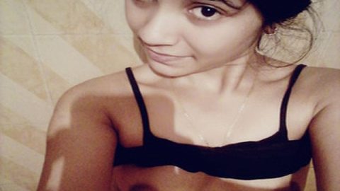 Cute girl making video of her naked boobs