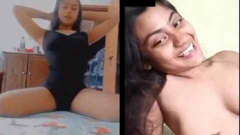 Cute girl pressing boobs during video call