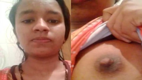 Innocent-looking girl showing her erect nipples