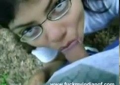 Indian teen girl sucks her lover's dick in the park