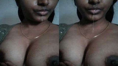 Naughty Desi girl spitting on her own boobs