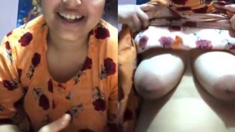 Shy Desi Bhabhi showing her big boobs on camera