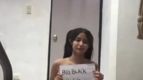 Cute girl taking big black dildo